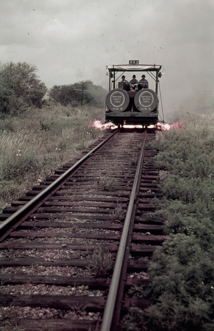 Getting rid of railroad weeds with a burning train, 1941 22 Words